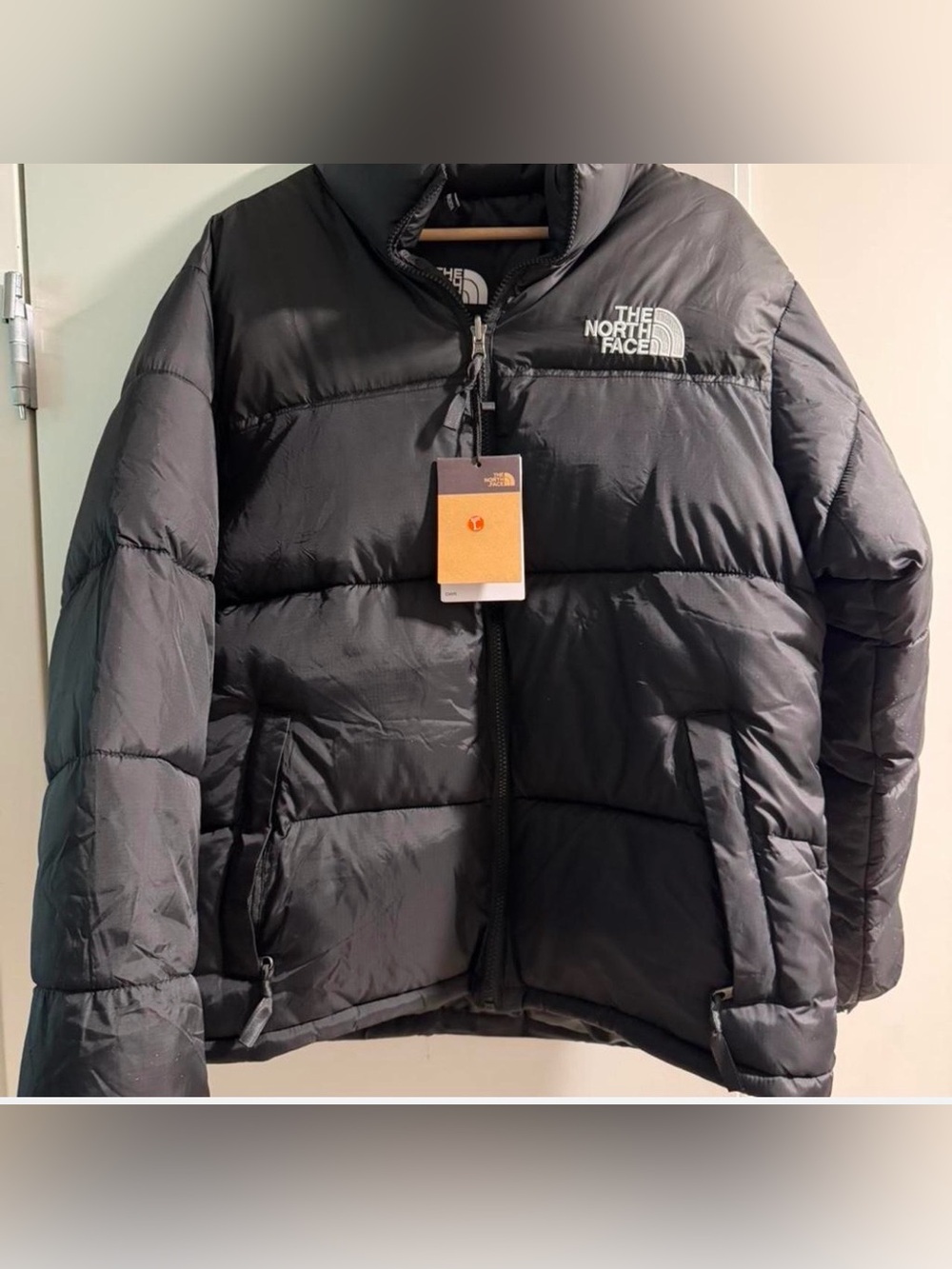 The North Face Men’s Black Puffer Jacket with Chest Logo